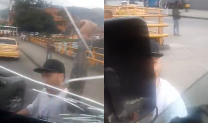 (Video) Taxista ataca con arma blanca a un bus de servicio público