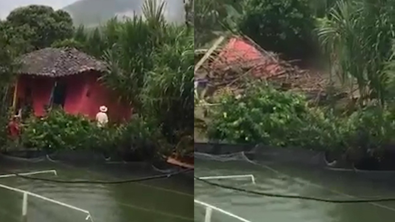 Momento en que a campesino se le cae la casa por culpa de las lluvias